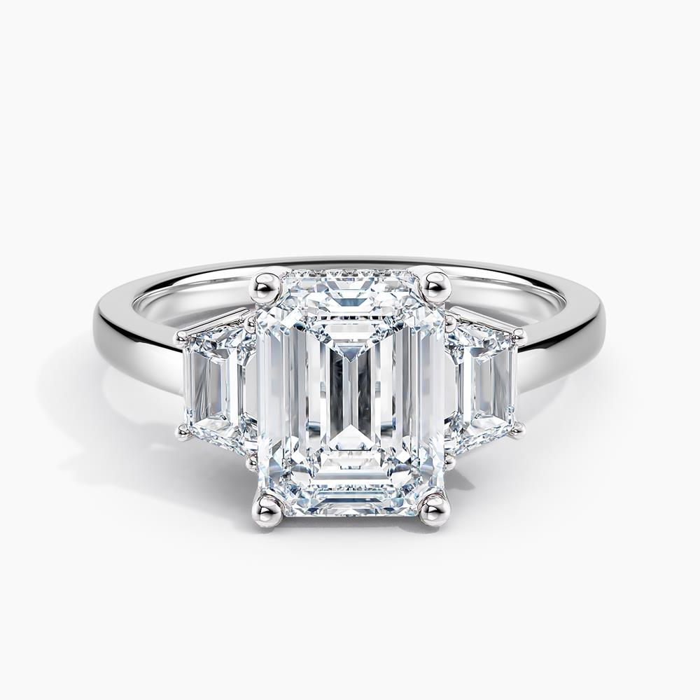 Simran Collection — Under Halo Three Stone Lab Grown Diamond Engagement Ring 1.50 ct. Center Emerald Lab Grown Diamond with Lab Grown Trapezoid Side Stones in 14K White Gold