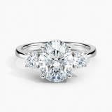 Under Halo Three Stone Lab Grown Diamond Engagement Ring 1.00 ct. Center Oval Lab Grown Diamond in 14K White Gold. he ring can be set with other shapes, carat weights and clarity . Please contact us with any questions.