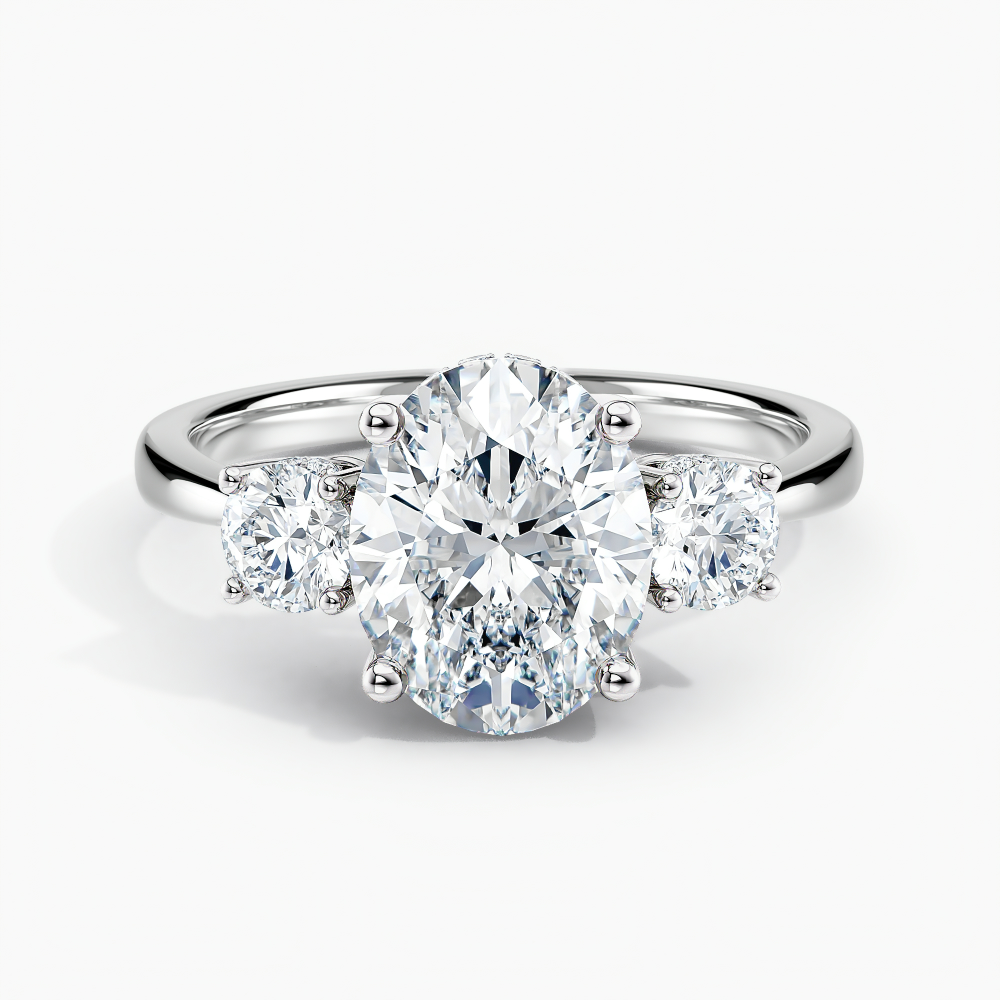 Simran Collection — Under Halo Three Stone Lab Grown Diamond Engagement Ring 1.00 ct. Center Oval Lab Grown Diamond in 14K White Gold. he ring can be set with other shapes, carat weights and clarity . Please contact us with any questions.