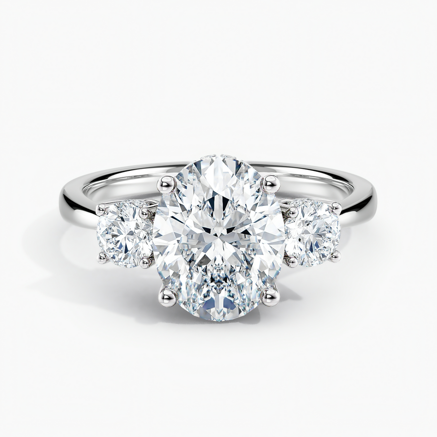Simran Collection — Under Halo Three Stone Lab Grown Diamond Engagement Ring 1.00 ct. Center Oval Lab Grown Diamond in 14K White Gold. he ring can be set with other shapes, carat weights and clarity . Please contact us with any questions.