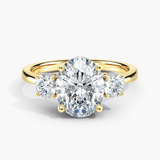 Under Halo Three Stone Lab Grown Diamond Engagement Ring 1.00 ct. Center Oval Lab Grown Diamond in 14K White Gold. he ring can be set with other shapes, carat weights and clarity . Please contact us with any questions.